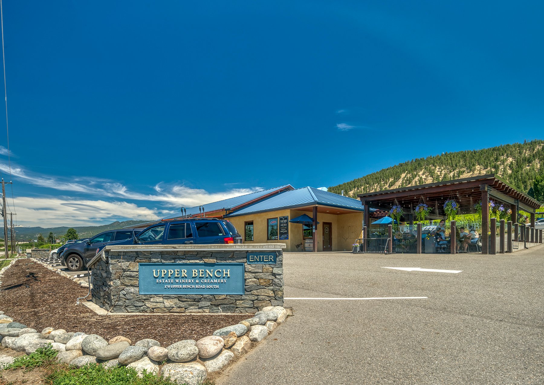 Upper Bench Winery exterior and sign, blue skies