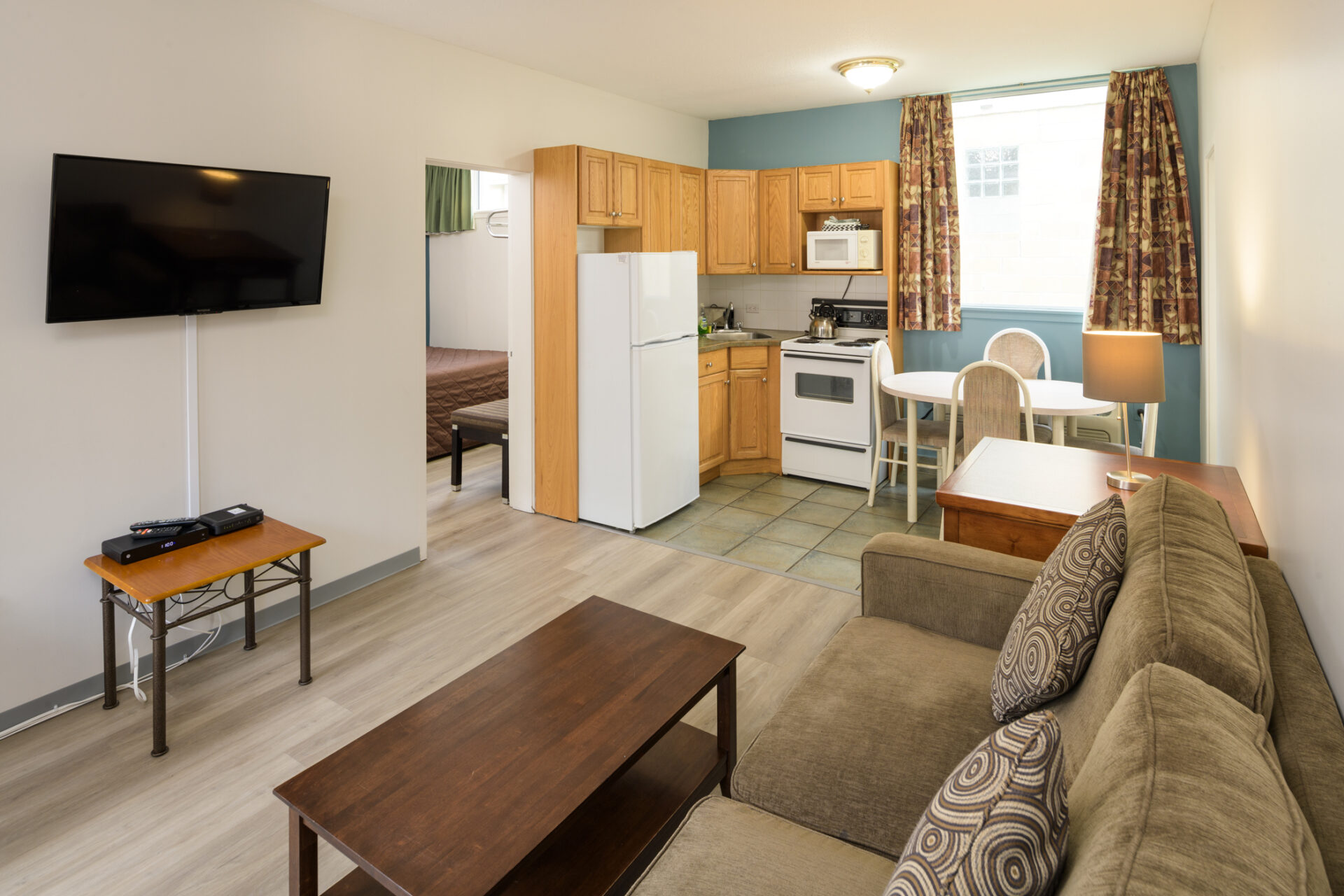 spanish villa motel seating area and kitchen