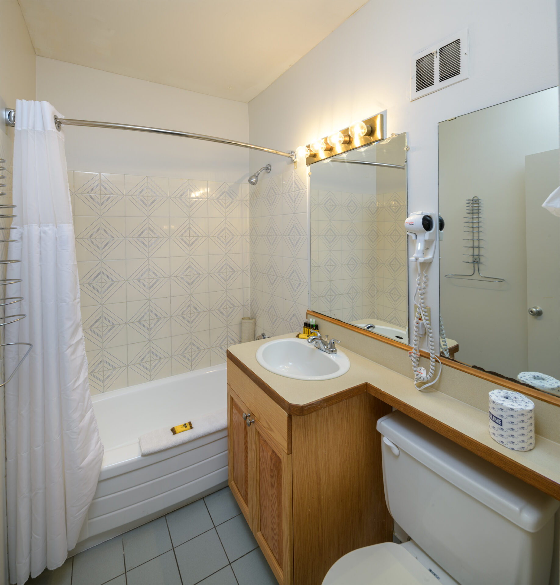 spanish villa motel full bathroom with shower