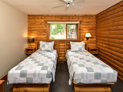 sandy beach lodge cabin bedroom two twin beds