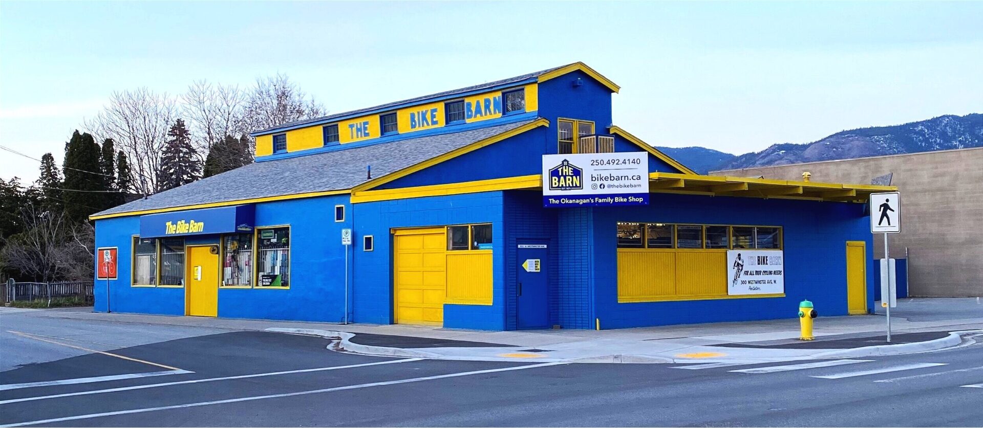 bike barn exterior yellow and blue building