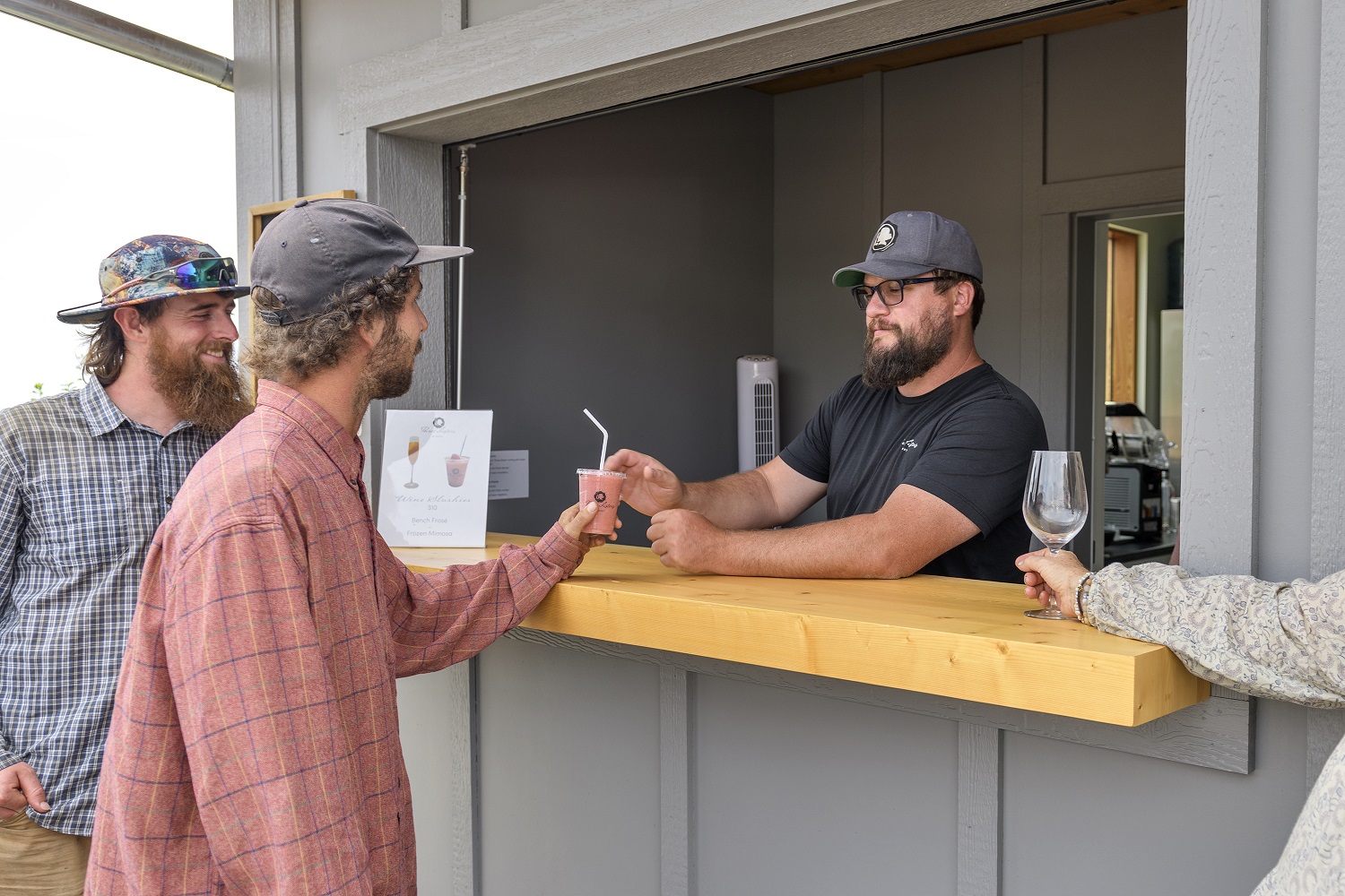 Three Sisters Winery serving frozen mimosa at outside bar