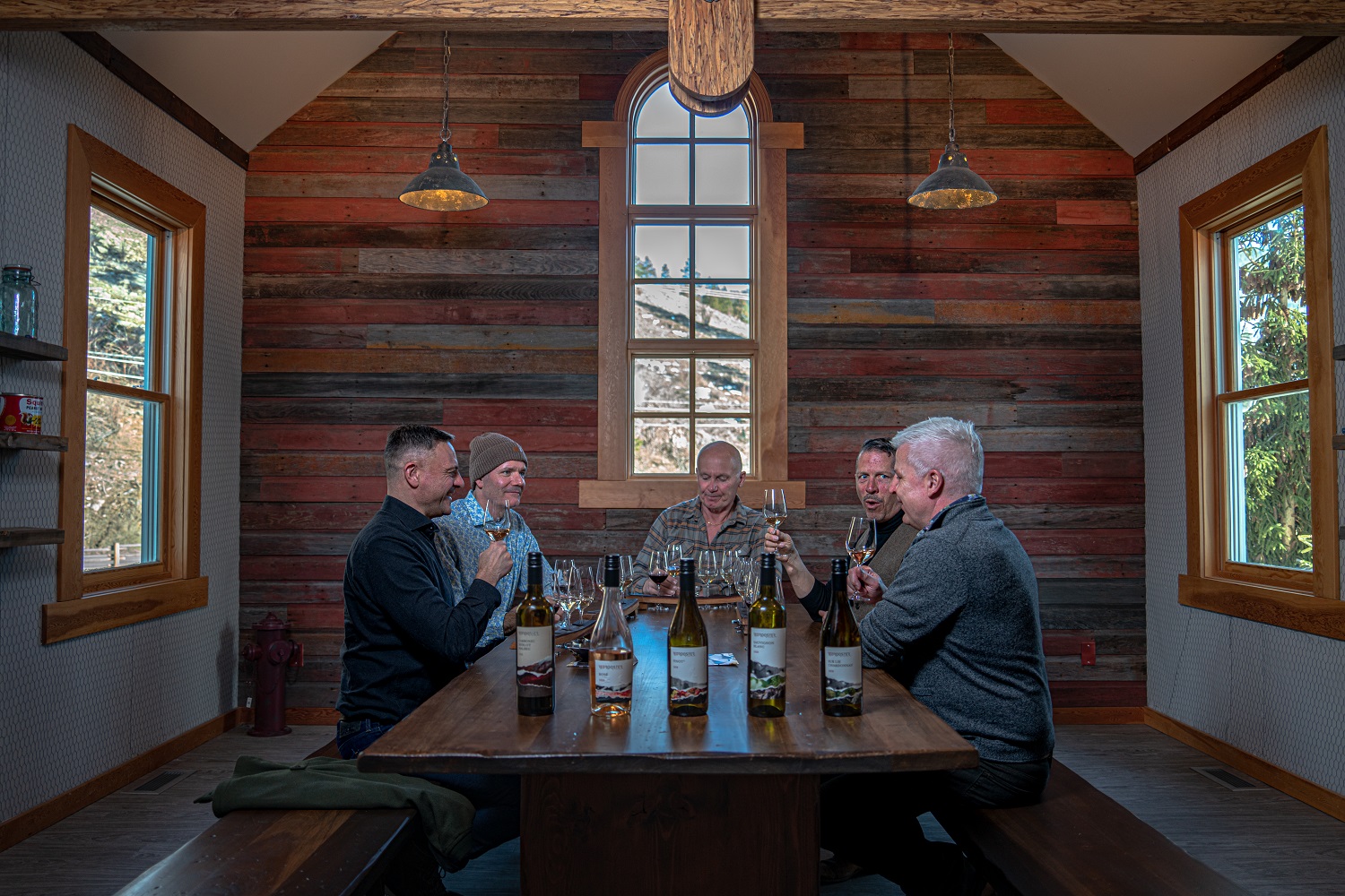 gay couple wine tasting on naramata bench