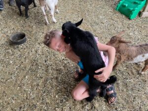 gottagoat farm kid on a kid