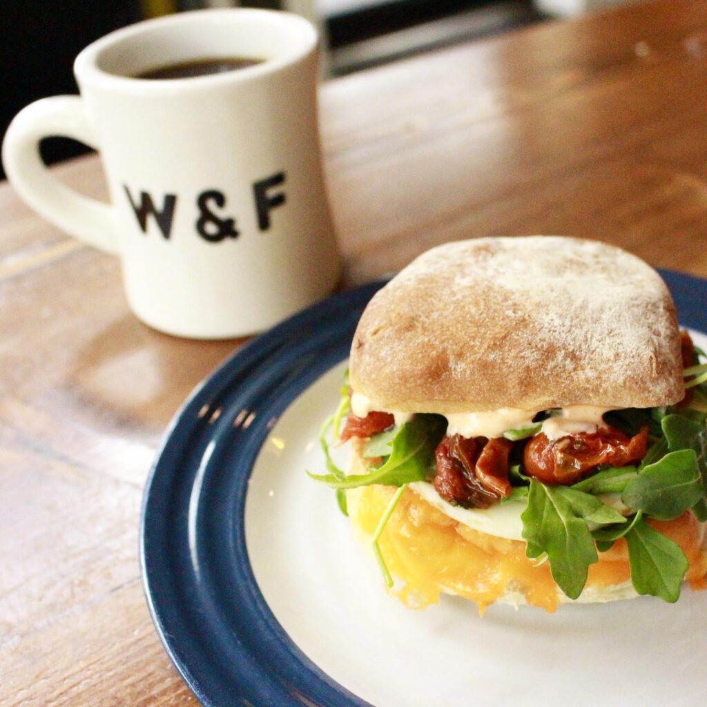 Coffee and breakfast sandwich at Wayne & Freda