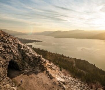 bicycle riding on the kvr towards little tunnel, views of Okanagan Lake looking towards Naramata and Penticton