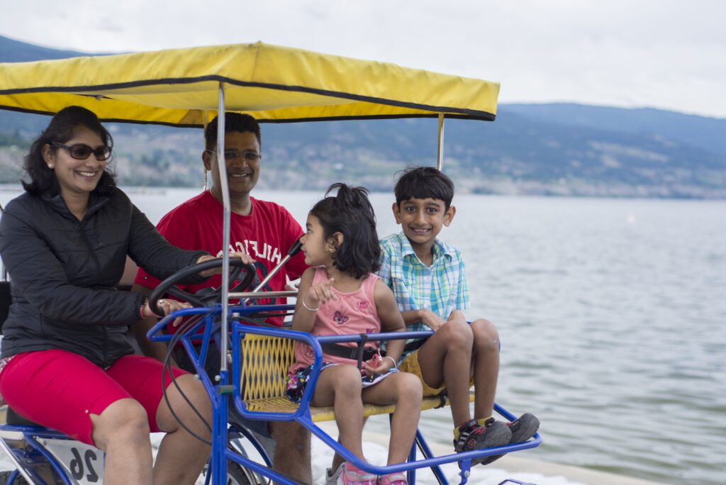 fun city penticton bike rentals family on pedal car