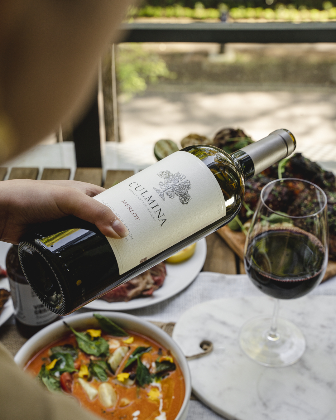 Culmina Family Estate Winery wine pouring