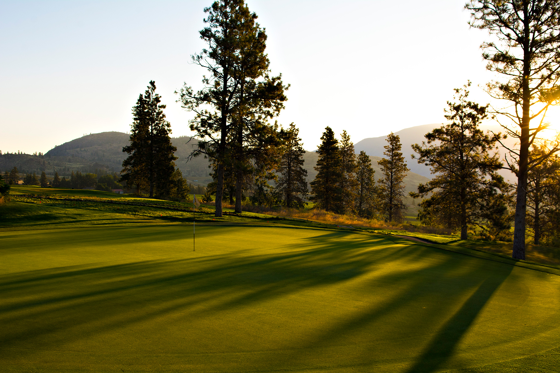 Fairview Mountain golf course green with morning light shadow
