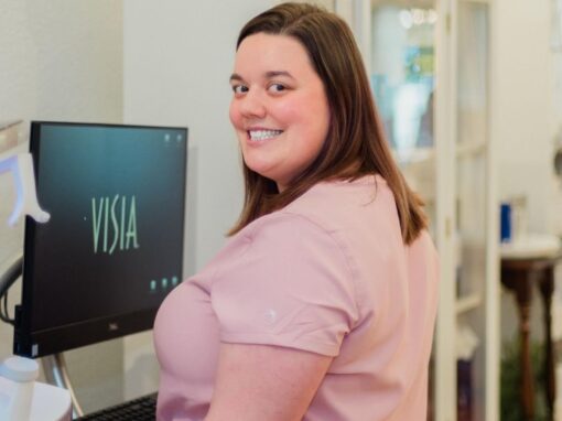 Staff on computer at La Creme de la Creme Skincare and Boutique