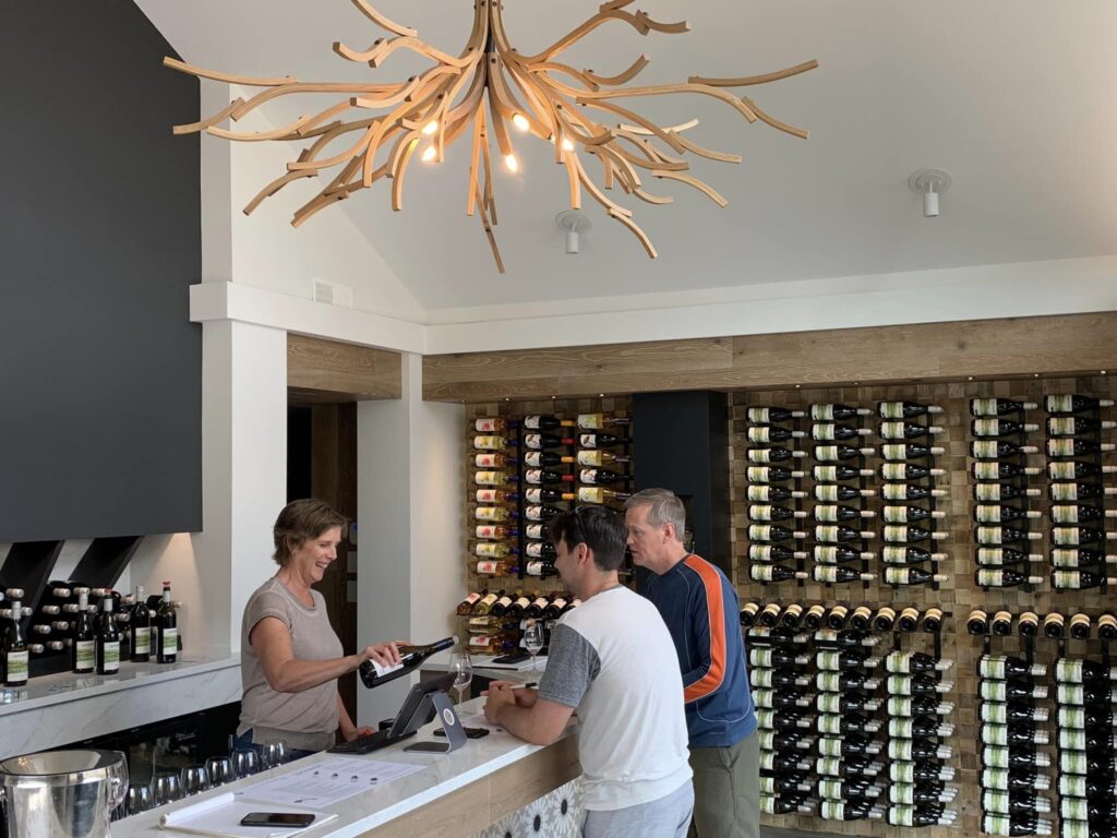 Lakeboat winery tasting room 2 people enjoying a tasting inside