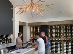 Lakeboat winery tasting room 2 people enjoying a tasting inside