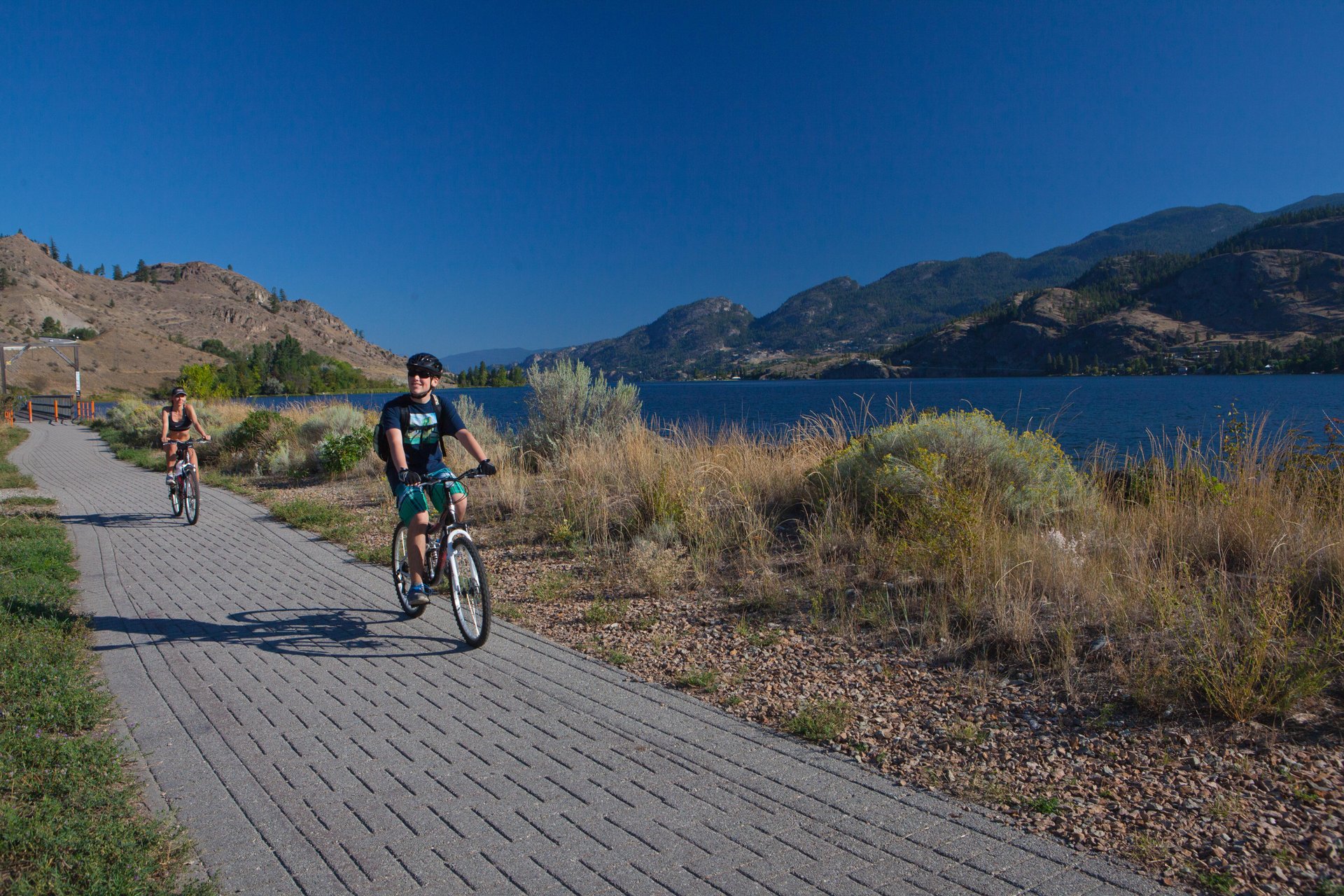 biking into okanagan falls on the kvr trail