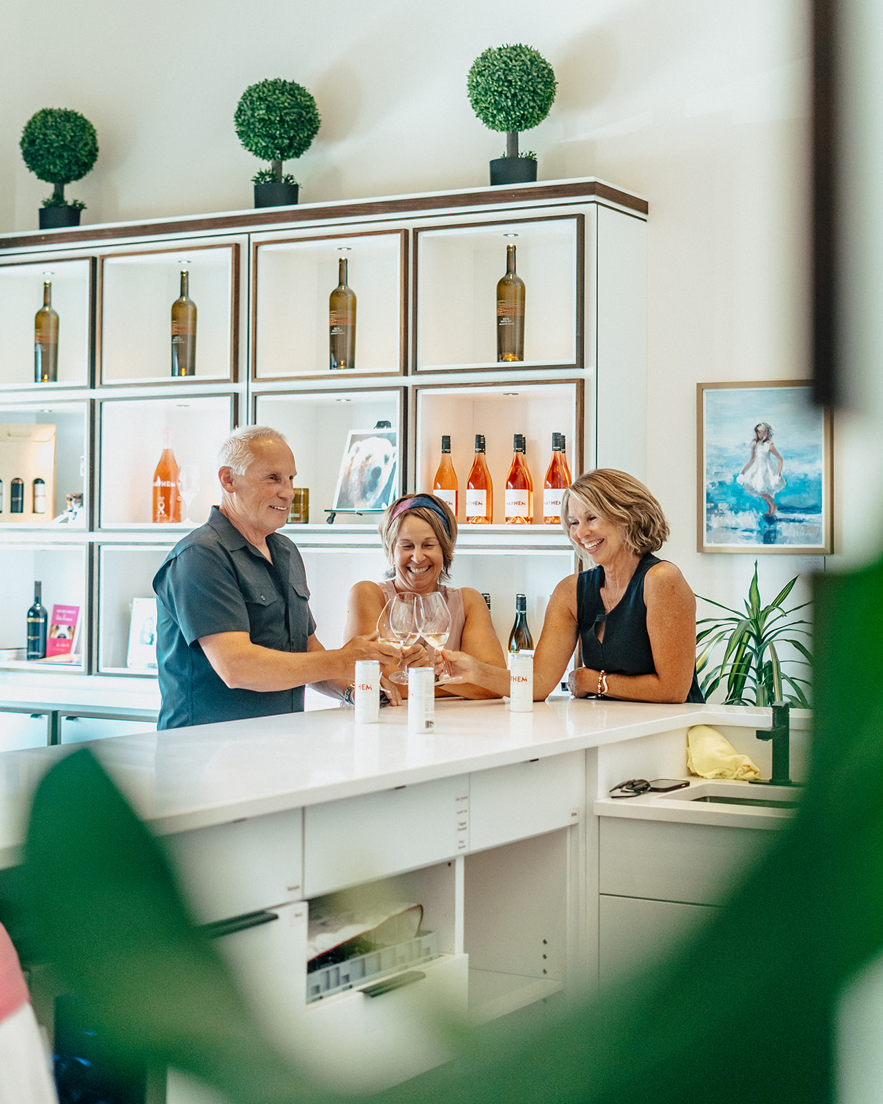 Guests enjoying wine in Mayhem Wines tasting room