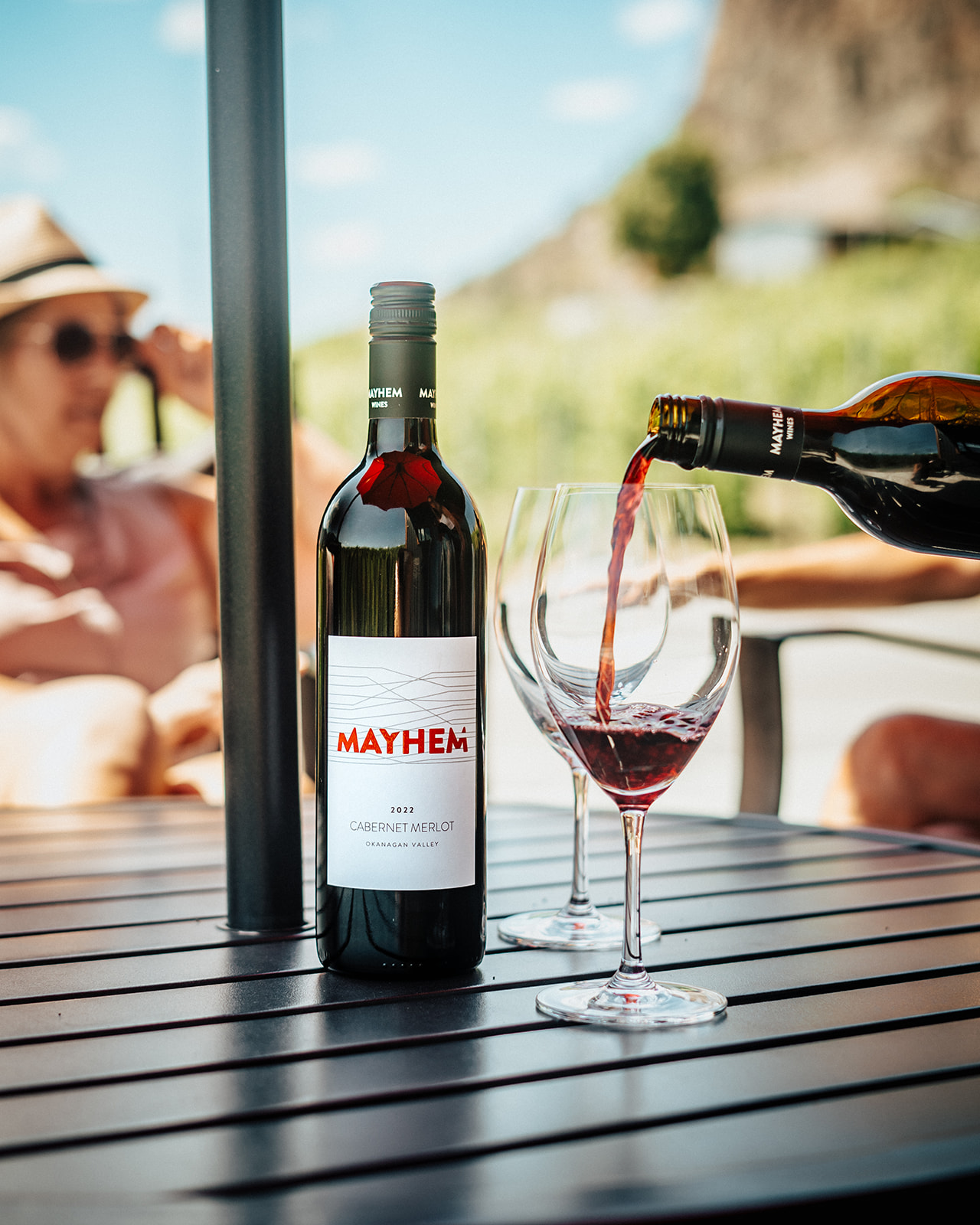 Guests enjoying Cabernet Merlot on Mayhem Wines patio
