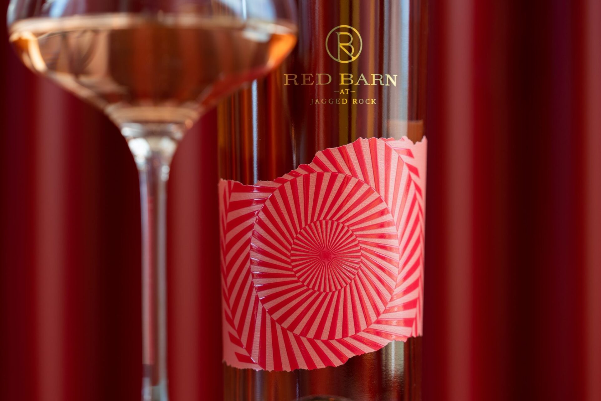 red barn winery rose bottle and glass