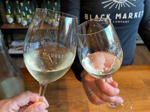 cheersing white wine from black market wine company
