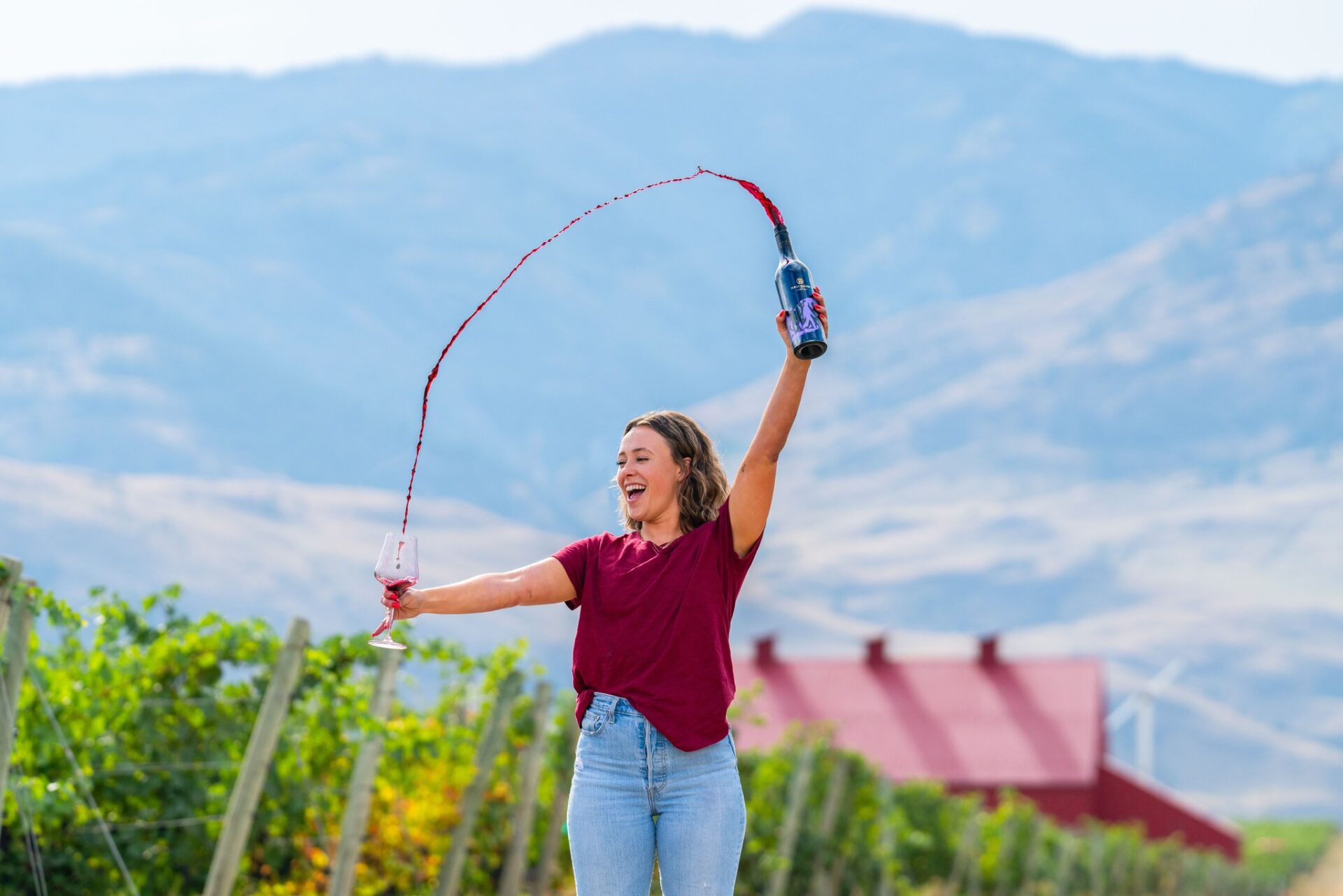 red barn winery wine pour over head