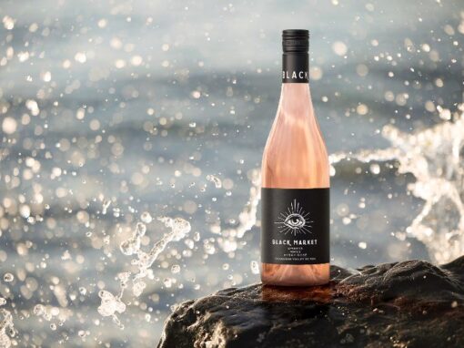 black market wine company rose in the water