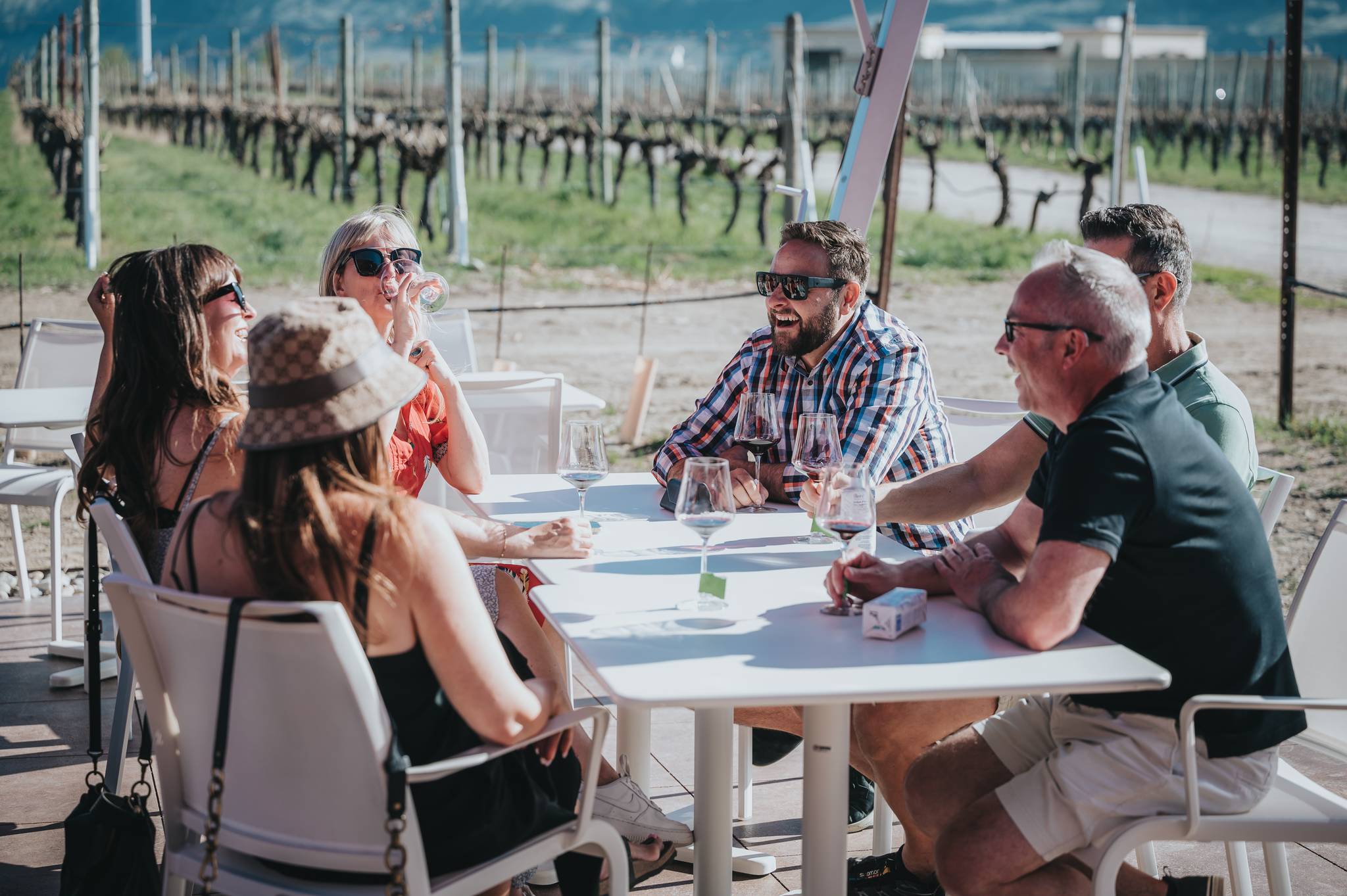 red barn winery people on patio