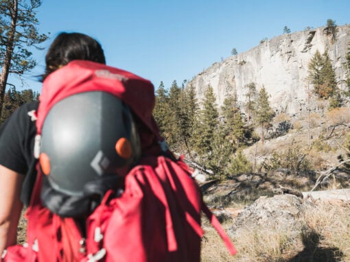 climber looking up at skaha bluffs