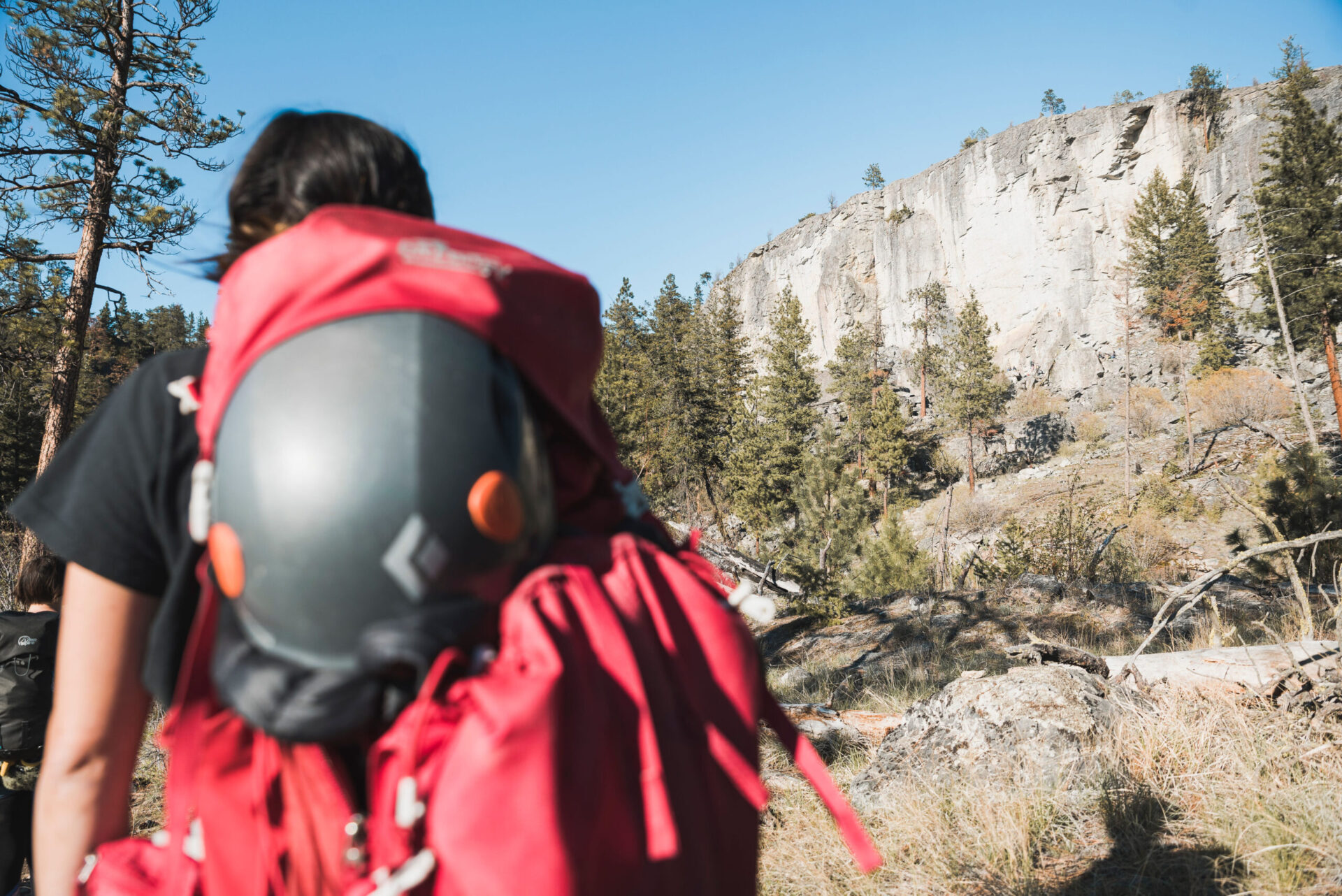 climber looking up at skaha bluffs