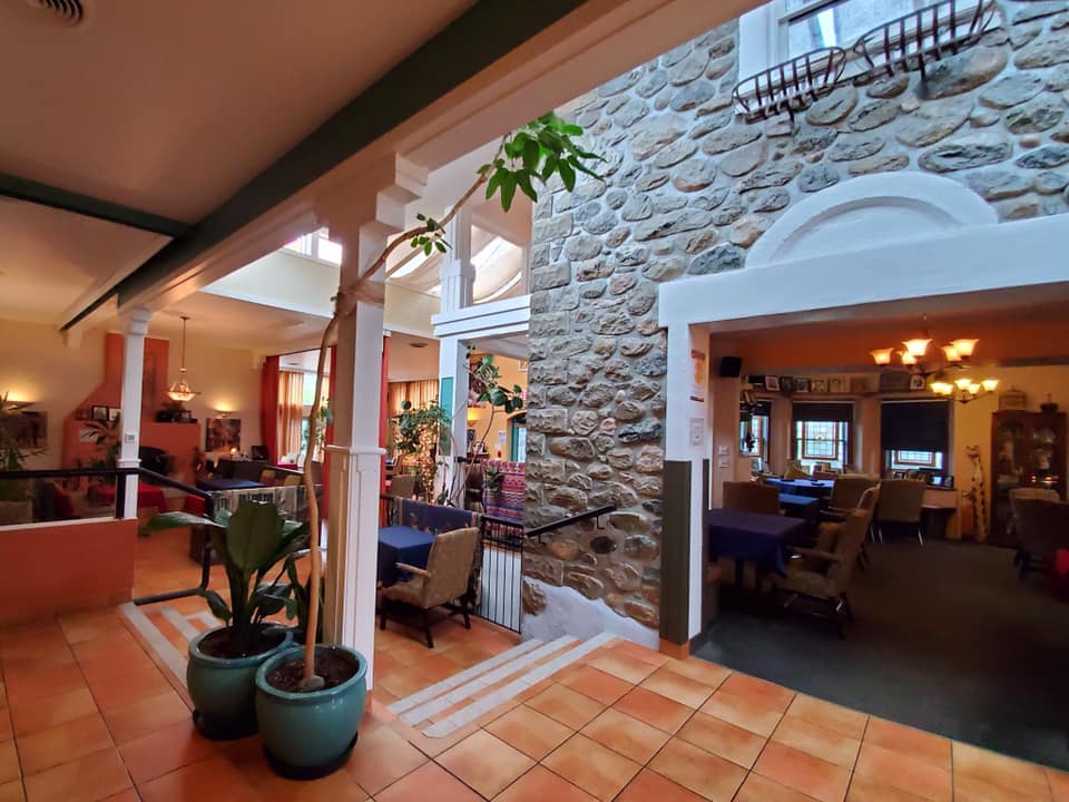 Zias Stonehouse interior with stone wall