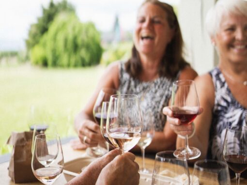 Red Rooster Winery ladies laughing with wine