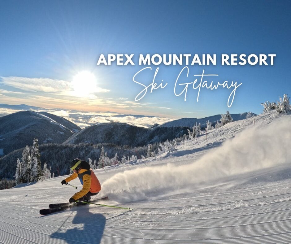 Save on your Ski & Stay at Summerland Waterfront Resort & Spa | Skier carving fresh powder at Apex Mountain Resort under blue skies during a winter ski getaway in the Okanagan.